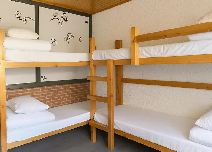 Tritón - Hostal Villanúa